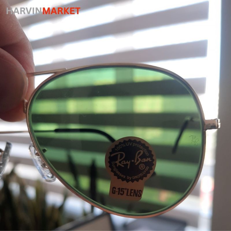 عینک آفتابی مردانه ری‌بن (Ray-Ban) مدل خلبانی – فریم طلایی و لنز G-15 سبز